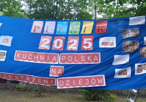 Na zdjęciu baner reklamowy wydarzenia.